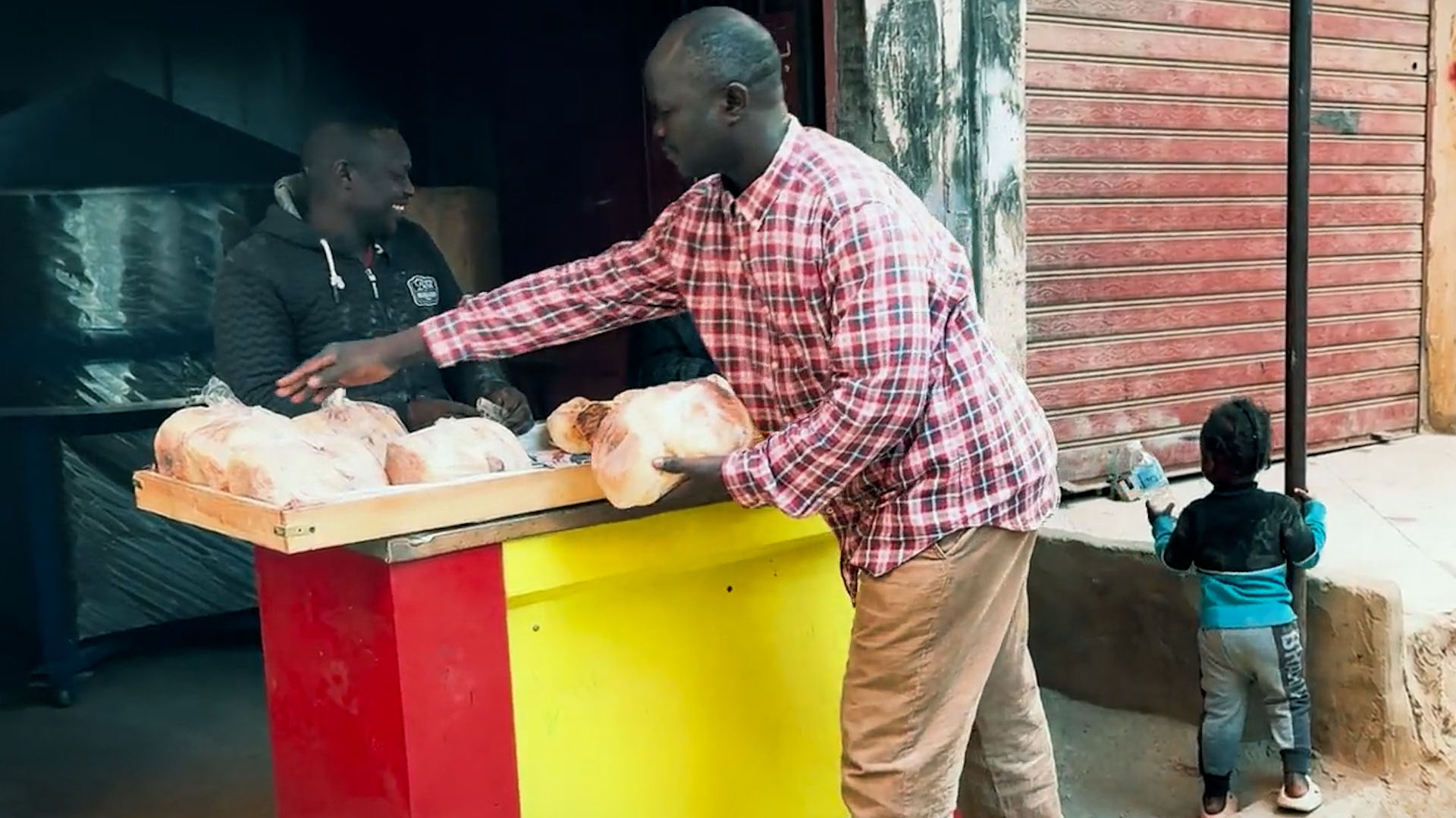 Sudanese Baker Shares Bread of Life With Customers